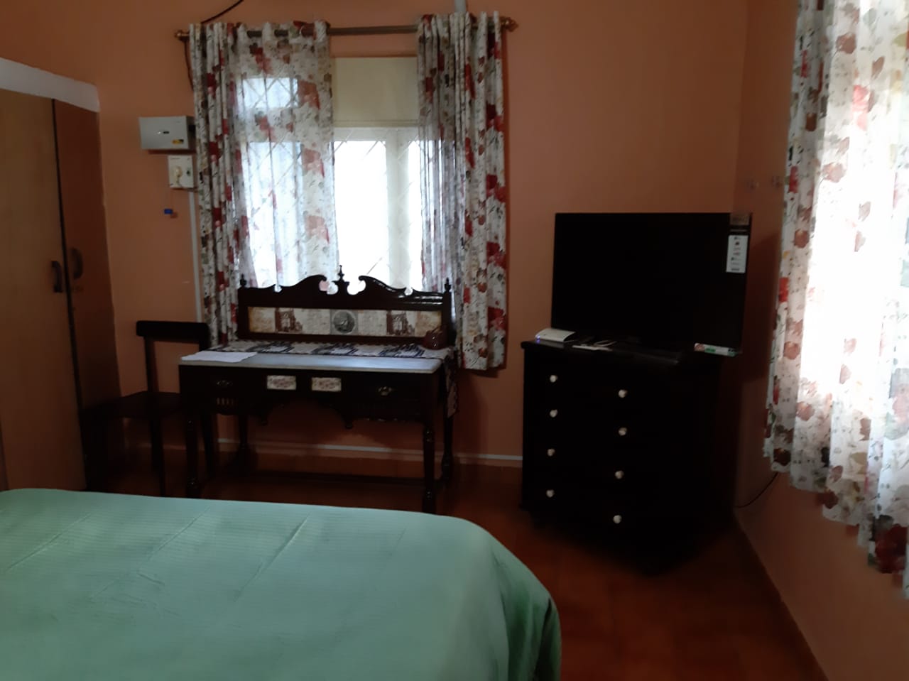 Brick villa exterior at Shalom Homestay